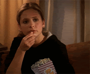 Buffy eats popcorn