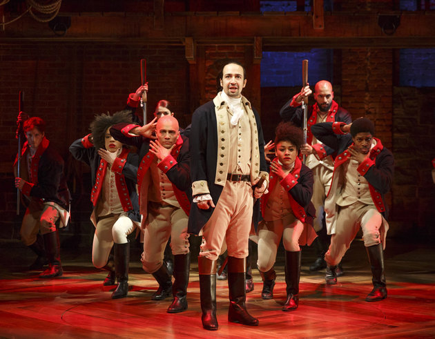 This image released by The Public Theater shows Lin-Manuel Miranda, foreground, with the cast during a performance of "Hamilton," in New York. "Hamilton," the hip-hop stage biography of Alexander Hamilton won the 2016 Pulitzer Prize for drama on Monday, April 18, 2016. (Joan Marcus/The Public Theater via AP)