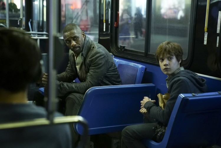 Roland Deschain (Idris Elba) and Jake Chambers (Tom Taylor) in Columbia Pictures' THE DARK TOWER.
